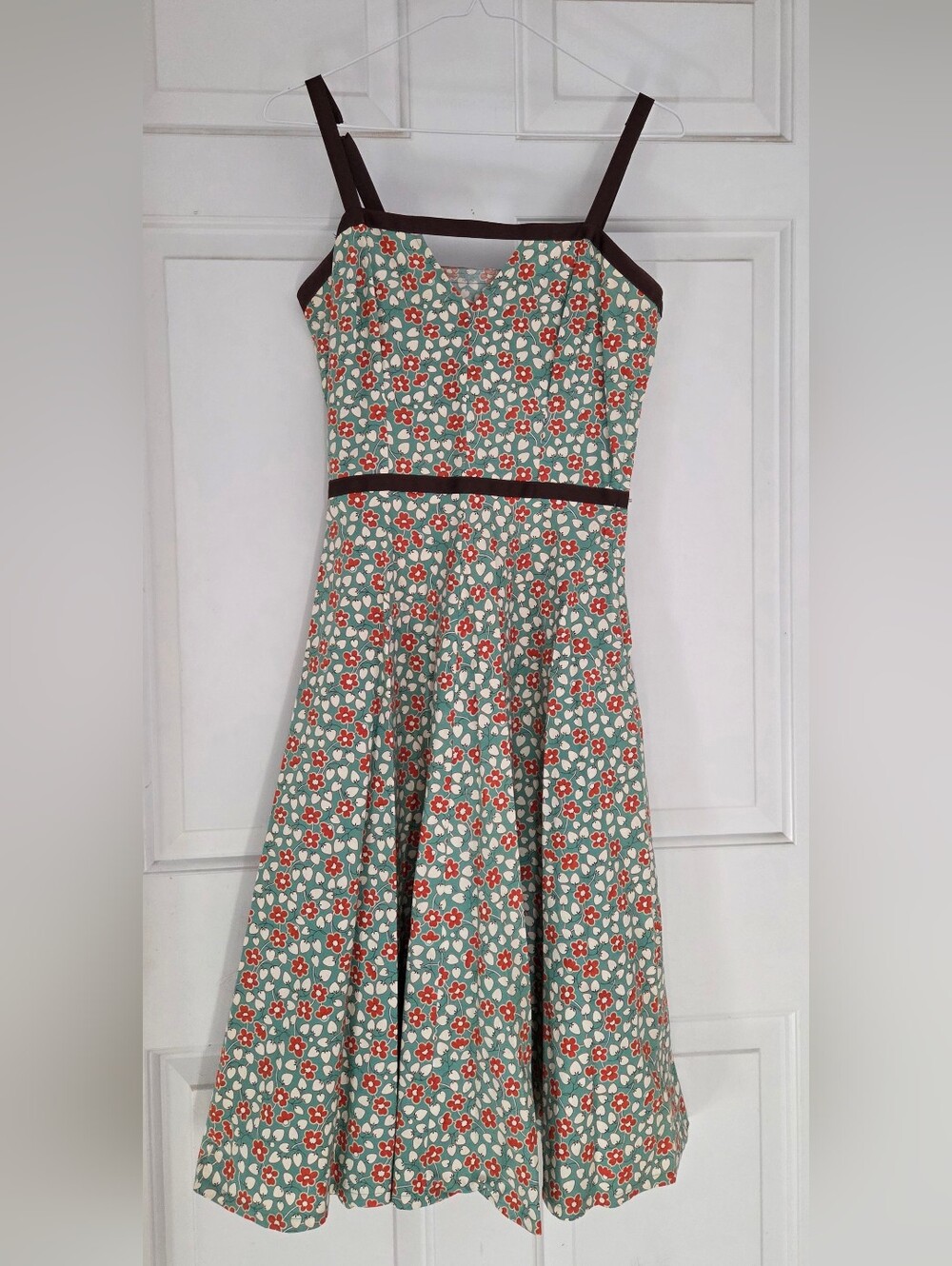 Handmade Teal Dress With Orange Flowers, White Berries And Brown Ribbon Detail